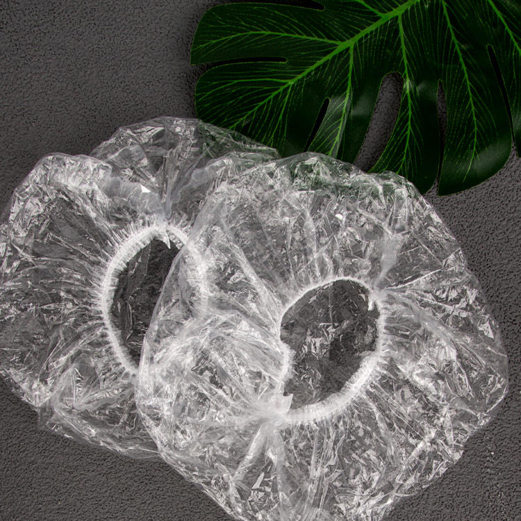 100Pcs Individually wrapped thicker plastic disposable hotel shower cap