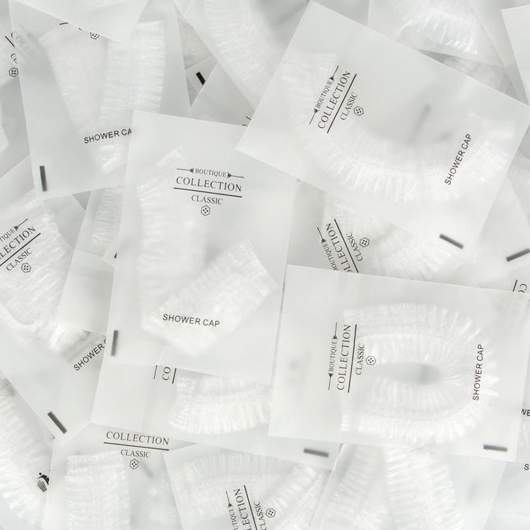 100Pcs Individually wrapped thicker plastic disposable hotel shower cap